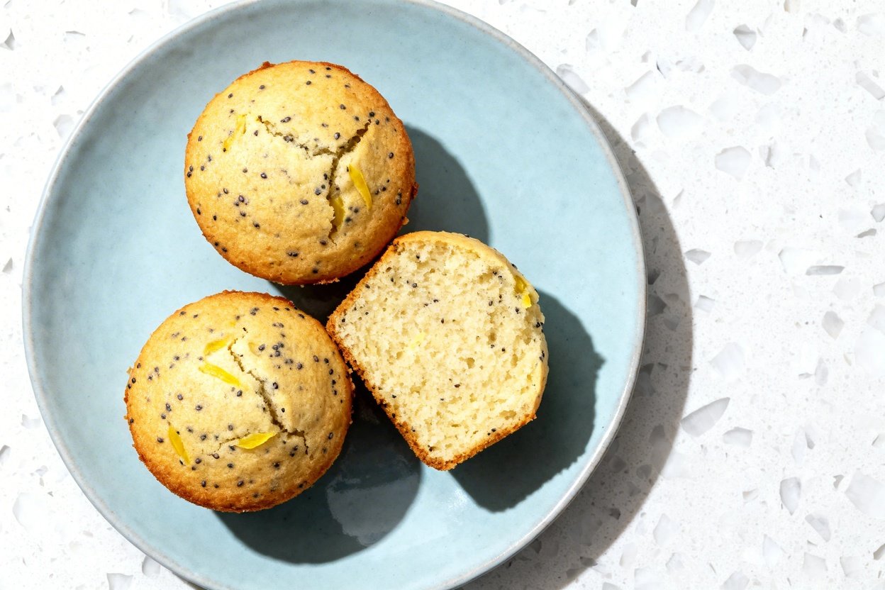 top-down food photo of the finished dish: keto lemon poppy seed muffins (same batch across the set)