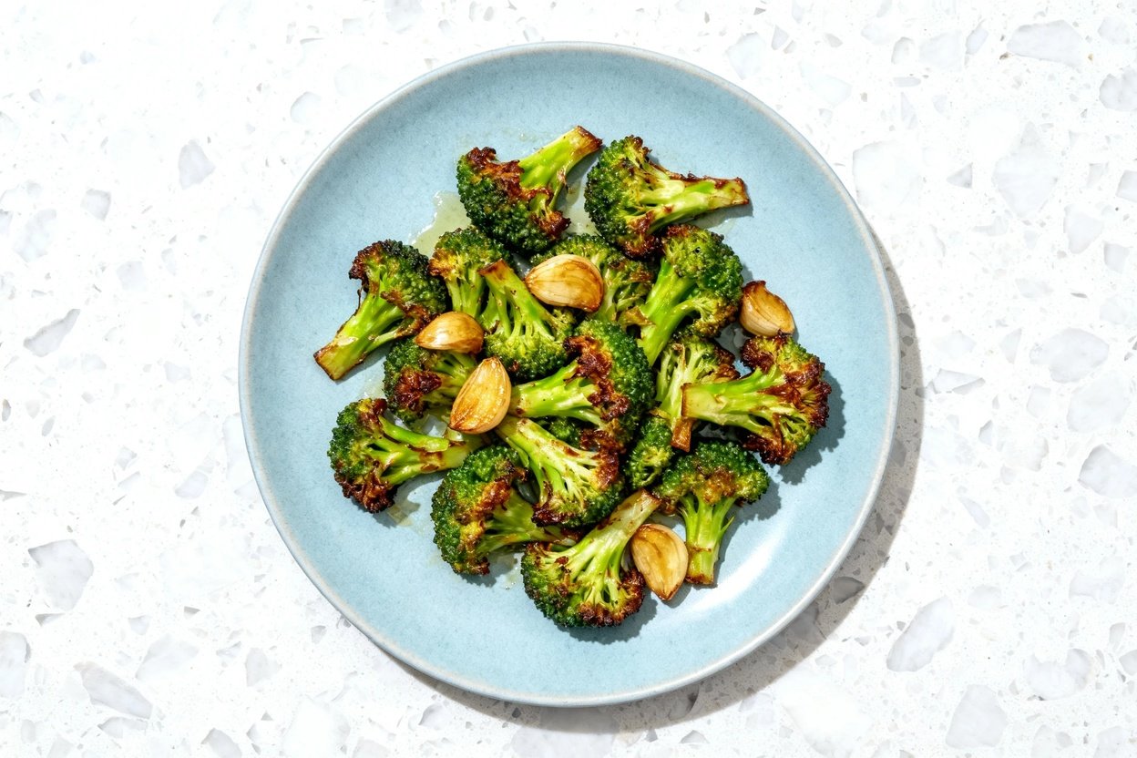 top-down food photo of a single serving of Low Carb Roasted Garlic Broccoli: roasted broccoli flore